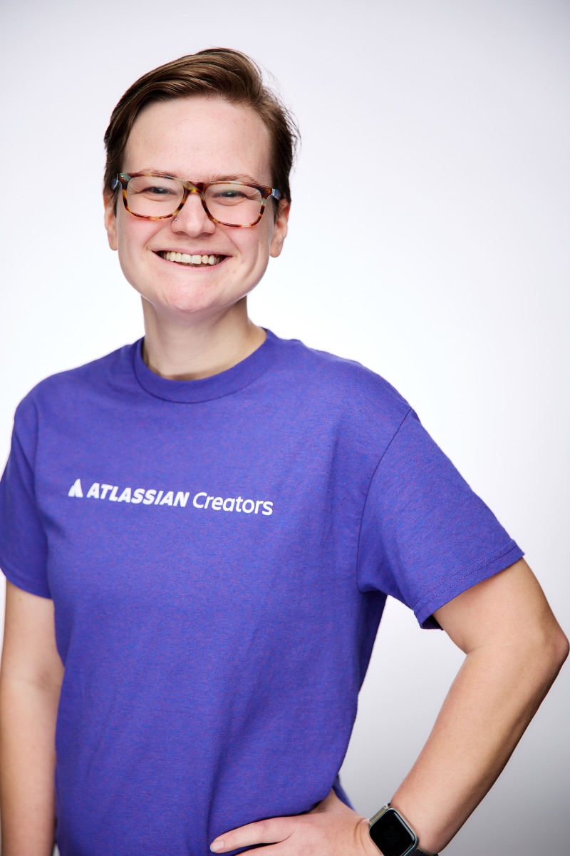 Brittany Joiner smiling, wearing an Atlassian Creators t-shirt